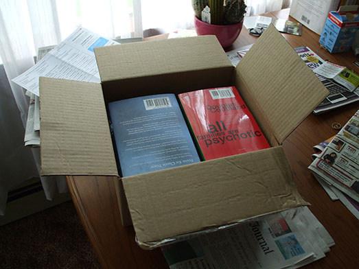 Towar zapakowany w karton zamiast w owijki na książki