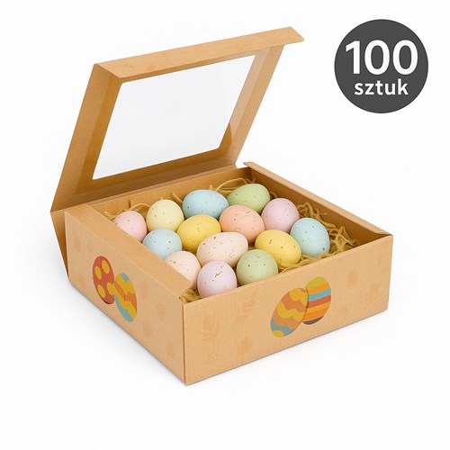 Duża ekspozycja 100 pudełek ustawionych warstwowo; neutralne, jasne tło z delikatnymi akcentami wielkanocnymi (pisanki/gałązki).