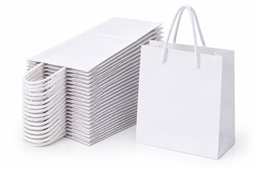 Zestaw 25 białych toreb papierowych kraft o wymiarach 140 × 51 × 153 mm, wykonanych z papieru 200 g/m², z gładką powierzchnią pod nadruk i wymiennymi