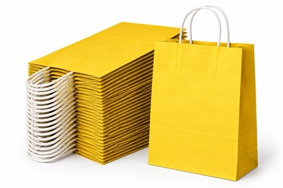 10 żółtych torebek papierowych prezentowych A4 o wymiarach 240 × 100 × 320 mm i pojemności 7,5 l, z papierowymi uchwytami sznurkowymi i dnem klockowym